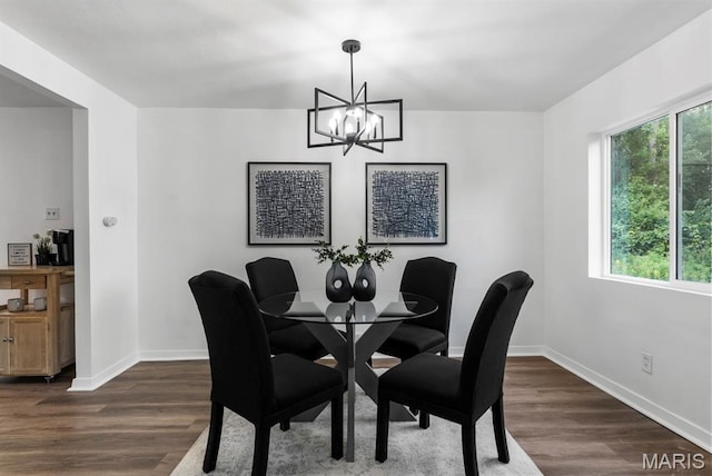 911 Cordova St, Saint Ferdinand Township, MO 63138 - dining area featuring a chandelier and dark wood finished floors
