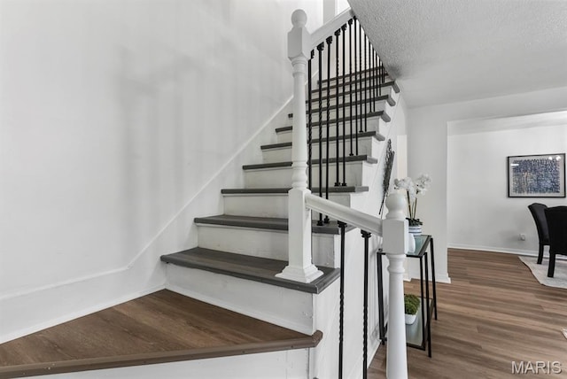 911 Cordova St, Saint Ferdinand Township, MO 63138 - stairs with wood finished floors and a textured ceiling