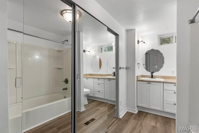 911 Cordova St, Saint Ferdinand Township, MO 63138 - bathroom with wood finished floors, shower / tub combination, and vanity