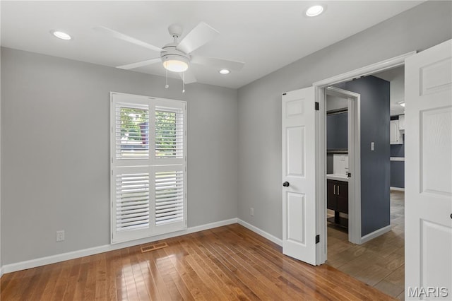 502 Lalor Dr, Manchester, MO 63011 - spare room with ceiling fan, hardwood / wood-style flooring, and recessed lighting