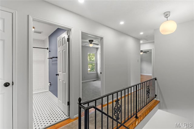 502 Lalor Dr, Manchester, MO 63011 - hallway with an upstairs landing and recessed lighting