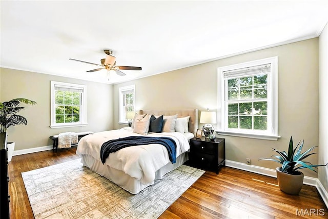 8049 Gannon Ave, Saint Louis, MO 63130 - bedroom with ornamental molding, wood finished floors, and ceiling fan