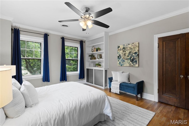 316 Melville Ave, University City, MO 63130 - bedroom featuring wood finished floors, ornamental molding, and a ceiling fan