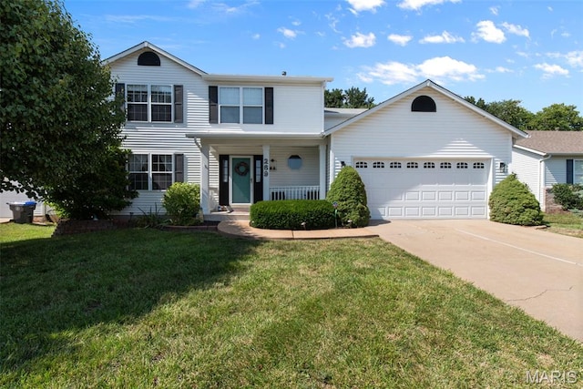 269 Sassafras Parc Dr, Ofallon, MO 63368 - traditional-style house featuring an attached garage, concrete driveway, a porch, and a front lawn
