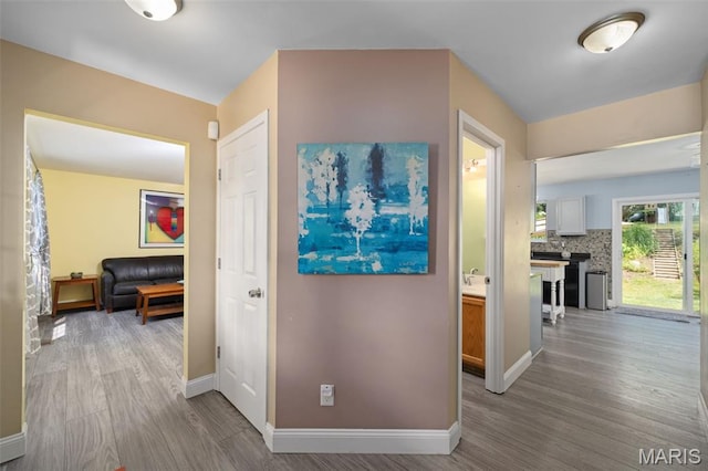269 Sassafras Parc Dr, Ofallon, MO 63368 - hallway featuring wood finished floors