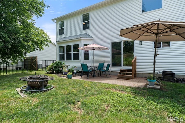 269 Sassafras Parc Dr, Ofallon, MO 63368 - back of house with a fire pit, entry steps, and a patio