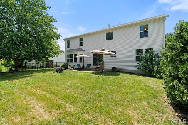 269 Sassafras Parc Dr, Ofallon, MO 63368 - rear view of property with an outdoor fire pit and a patio