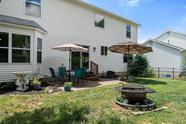 269 Sassafras Parc Dr, Ofallon, MO 63368 - back of house featuring an outdoor fire pit, a patio area, and entry steps