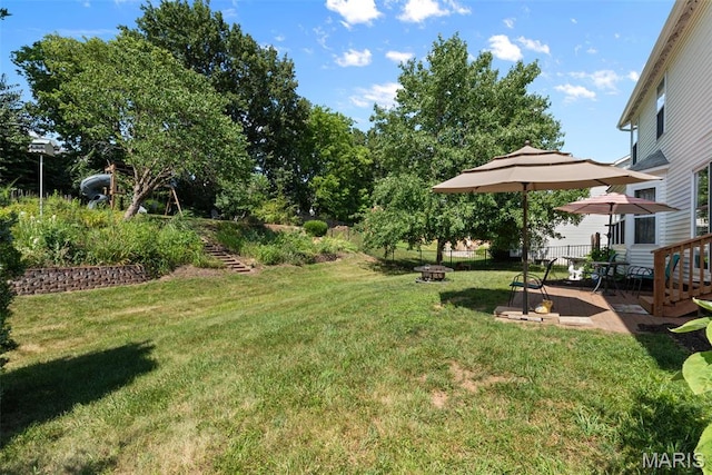 269 Sassafras Parc Dr, Ofallon, MO 63368 - view of yard with an outdoor fire pit