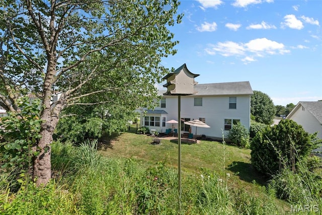 269 Sassafras Parc Dr, Ofallon, MO 63368 - rear view of house featuring a yard