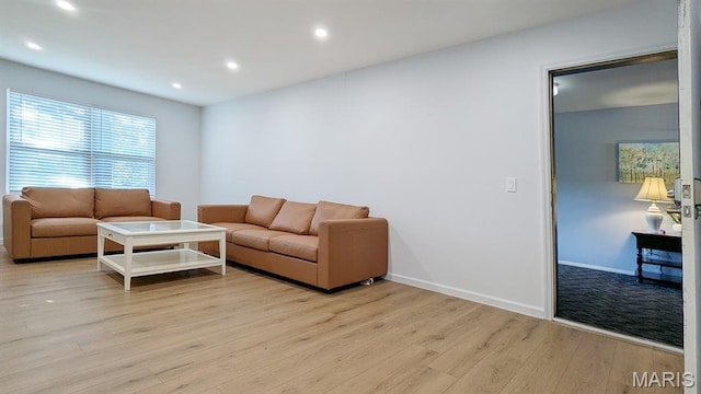 1669 Mayenne Ct Unit B, Mehlville, MO 63125 - living area featuring light wood finished floors and recessed lighting