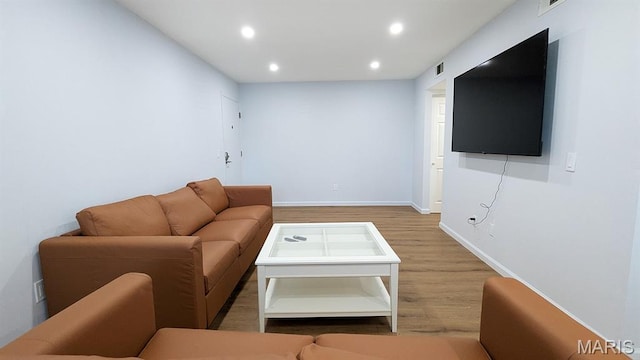 1669 Mayenne Ct Unit B, Mehlville, MO 63125 - living area with wood finished floors and recessed lighting