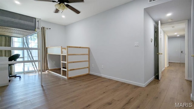 1669 Mayenne Ct Unit B, Mehlville, MO 63125 - bedroom with wood finished floors and recessed lighting