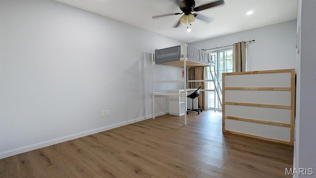 1669 Mayenne Ct Unit B, Mehlville, MO 63125 - bedroom featuring wood finished floors and recessed lighting