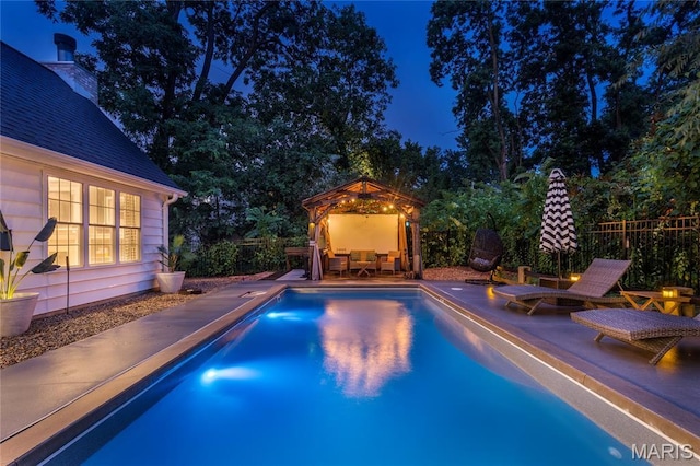 220 Orrick Ln, Kirkwood, MO 63122 - pool at twilight with a patio