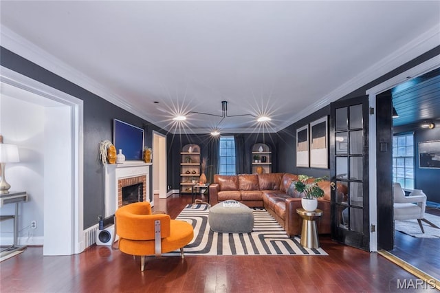220 Orrick Ln, Kirkwood, MO 63122 - living area featuring wood-type flooring, crown molding, a fireplace, and built in shelves
