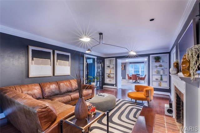 220 Orrick Ln, Kirkwood, MO 63122 - living area featuring wood finished floors, crown molding, built in shelves, and a fireplace