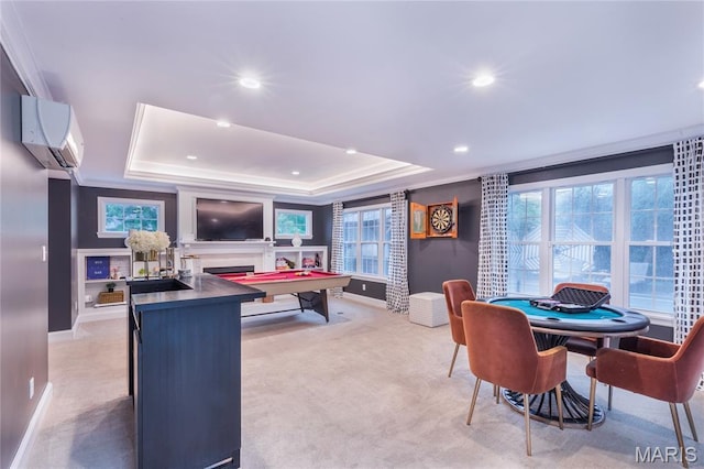 220 Orrick Ln, Kirkwood, MO 63122 - recreation room with an AC wall unit, a raised ceiling, light colored carpet, plenty of natural light, and recessed lighting