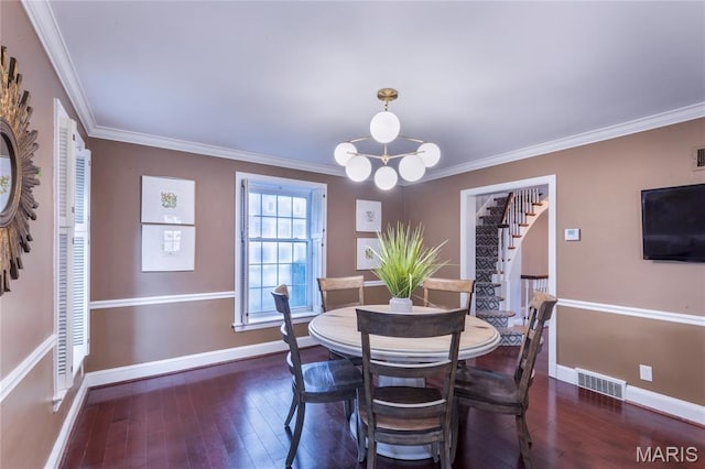 220 Orrick Ln, Kirkwood, MO 63122 - dining room with stairs, ornamental molding, hardwood / wood-style floors, and a chandelier