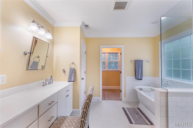 220 Orrick Ln, Kirkwood, MO 63122 - full bathroom with a freestanding tub, vanity, healthy amount of natural light, crown molding, and tile patterned flooring