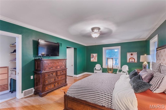 220 Orrick Ln, Kirkwood, MO 63122 - bedroom with light wood-type flooring, ornamental molding, and a ceiling fan