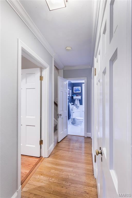 220 Orrick Ln, Kirkwood, MO 63122 - hall with crown molding and light wood-style flooring