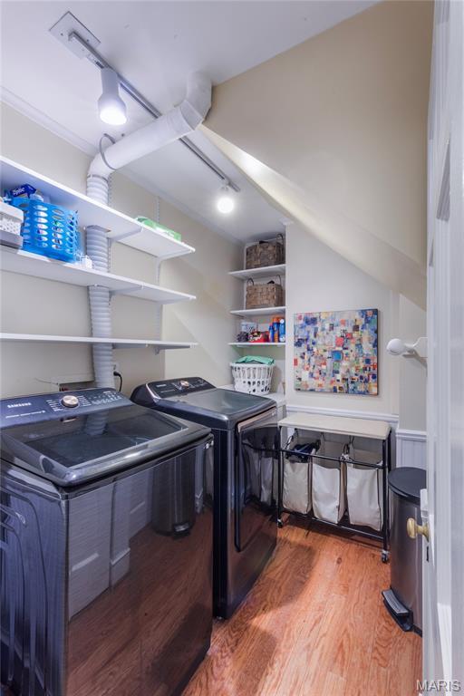 220 Orrick Ln, Kirkwood, MO 63122 - washroom with washing machine and dryer and wood finished floors