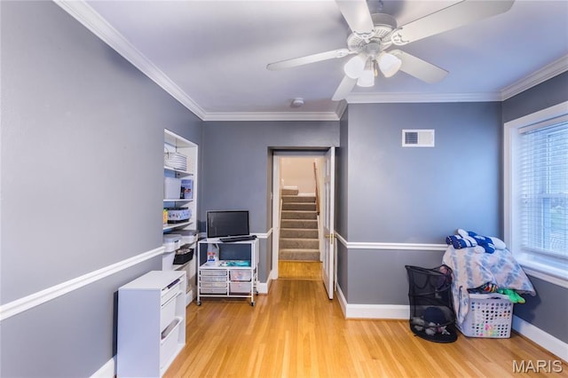 220 Orrick Ln, Kirkwood, MO 63122 - home office featuring light wood finished floors, crown molding, and ceiling fan