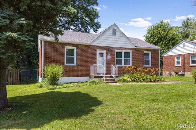 1485 E Duchesne Dr, Florissant, MO 63031 - view of front of property with brick siding and roof with shingles