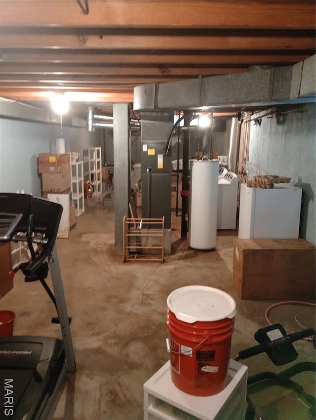 501 Carson Rd, Ferguson, MO 63135 - unfinished basement with water heater, washing machine and dryer, and heating unit