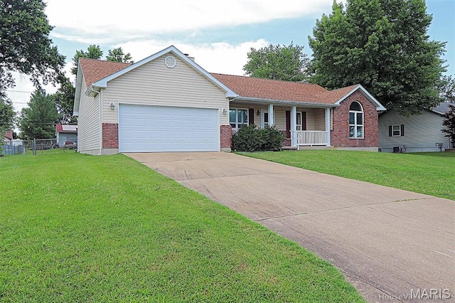 643 Woodgate St, Farmington, MO 63640 - single story home with covered porch, brick siding, concrete driveway, and an attached garage