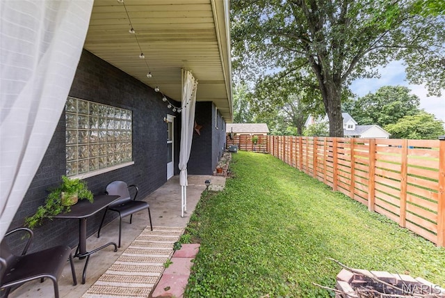 328 S Windmill St, Marine, IL 62061 - fenced backyard with a patio area