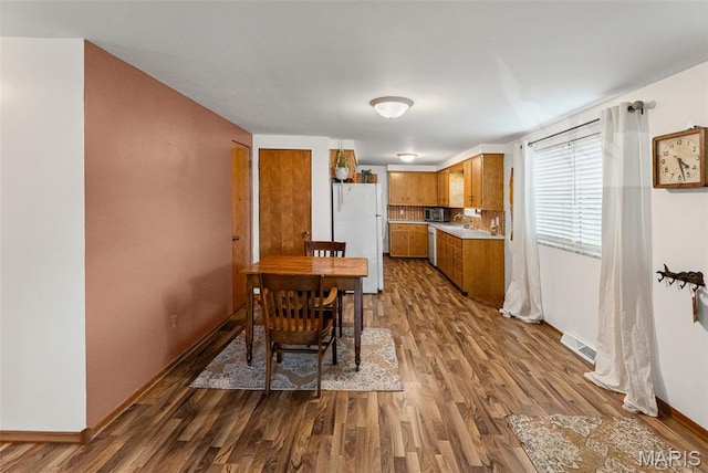 328 S Windmill St, Marine, IL 62061 - dining room featuring dark wood-type flooring and baseboards