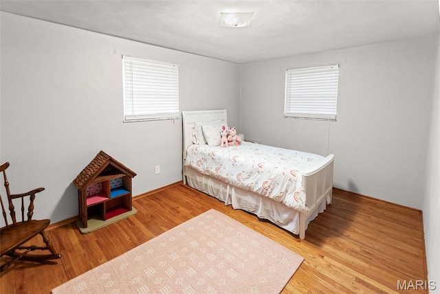 328 S Windmill St, Marine, IL 62061 - bedroom featuring multiple windows and wood finished floors