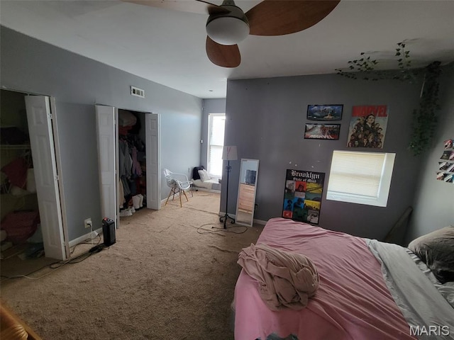 3761 Finney Ave, Saint Louis, MO 63113 - bedroom with light carpet and a ceiling fan