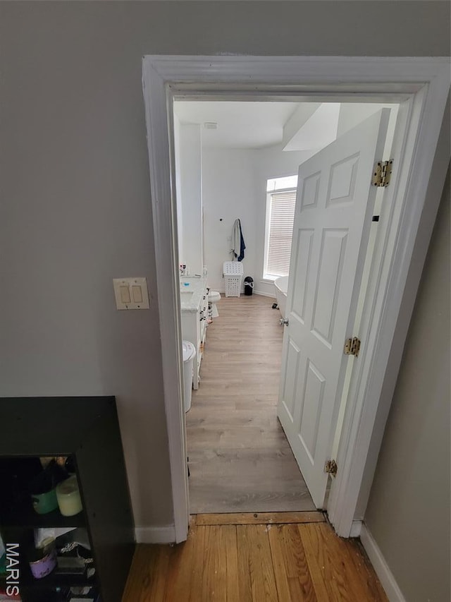 3761 Finney Ave, Saint Louis, MO 63113 - corridor with light wood-style flooring and baseboards