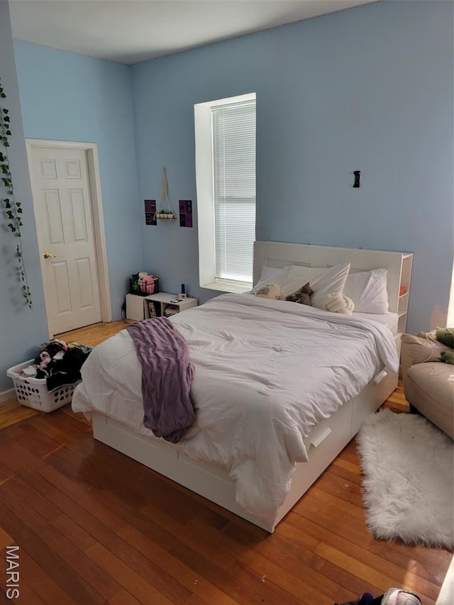 3761 Finney Ave, Saint Louis, MO 63113 - bedroom with hardwood / wood-style floors