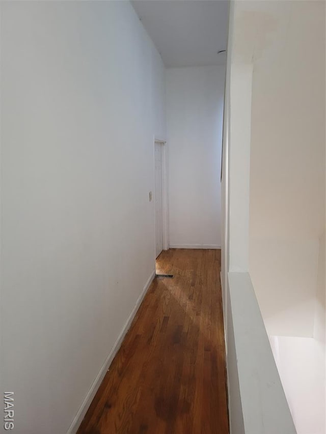 3761 Finney Ave, Saint Louis, MO 63113 - corridor with wood finished floors and baseboards