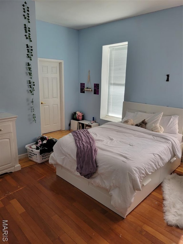 3761 Finney Ave, Saint Louis, MO 63113 - bedroom with hardwood / wood-style flooring