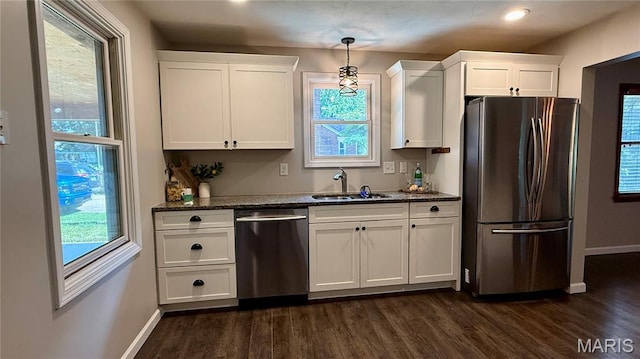 504 N Moore St, Waterloo, IL 62298 - kitchen featuring appliances with stainless steel finishes, white cabinets, dark wood-style floors, and recessed lighting