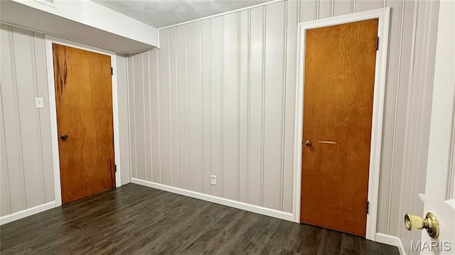 504 N Moore St, Waterloo, IL 62298 - unfurnished room featuring dark wood-style floors