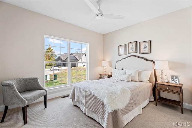 218 Discovery Meadows Pl, Ofallon, MO 63366 - bedroom with light colored carpet and ceiling fan