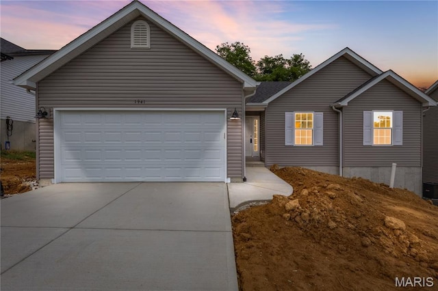 1941 Magnolia Way, Pevely, MO 63070 - view of front of property featuring concrete driveway and a garage