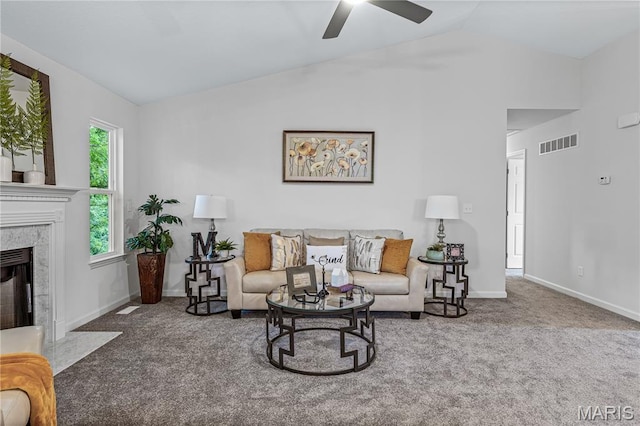 1941 Magnolia Way, Pevely, MO 63070 - carpeted living area featuring vaulted ceiling, ceiling fan, and a premium fireplace