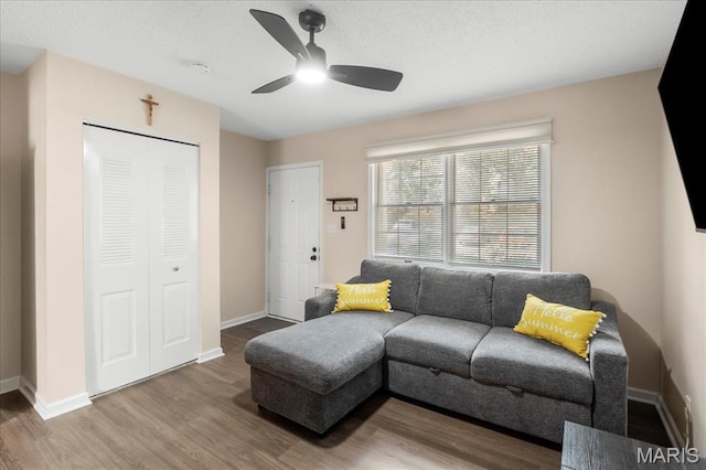 9053 W Swan Cir, Brentwood, MO 63144 - living room with ceiling fan and wood finished floors