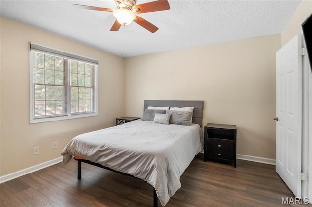 9053 W Swan Cir, Brentwood, MO 63144 - bedroom featuring wood finished floors, a ceiling fan, and a textured ceiling