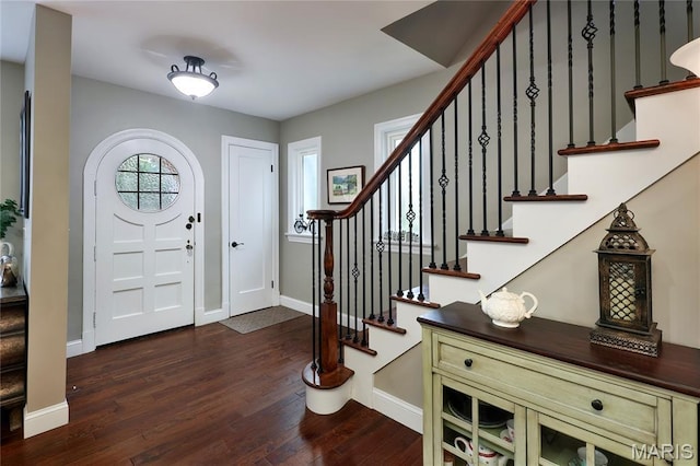728 Yale Ave, Saint Louis, MO 63130 - foyer entrance featuring dark wood finished floors and stairs