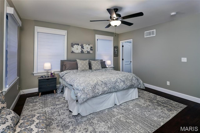 728 Yale Ave, Saint Louis, MO 63130 - bedroom featuring dark wood-style floors and ceiling fan