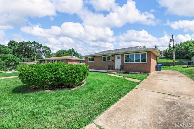 7944 Lavington Dr, Richmond Heights, MO 63117 - ranch-style home with brick siding, a front lawn, and driveway