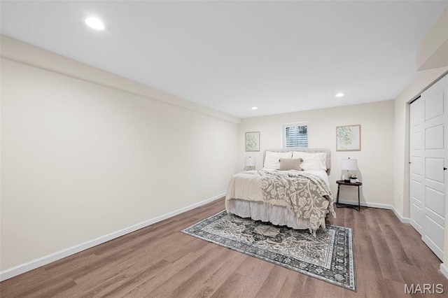 7944 Lavington Dr, Richmond Heights, MO 63117 - bedroom featuring wood finished floors and recessed lighting